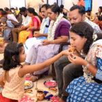 Students worshipped their parents on Guru Poornima
